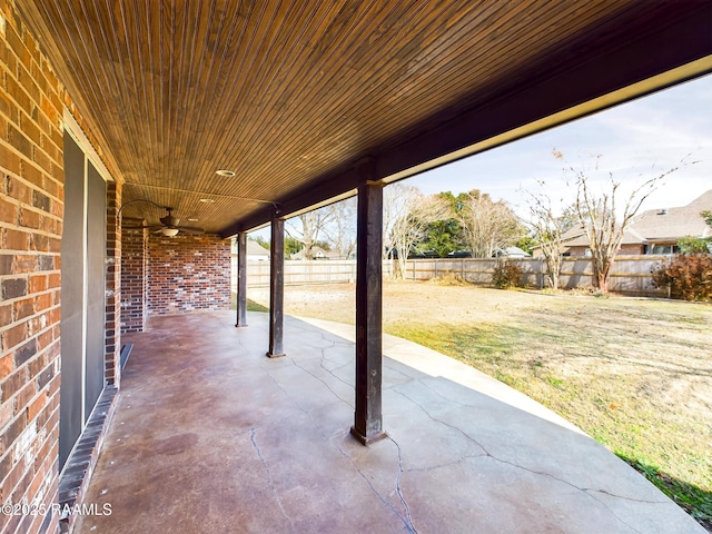 view of patio featuring ceiling fan