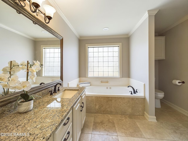 bathroom featuring tiled tub, ornamental molding, vanity, and toilet