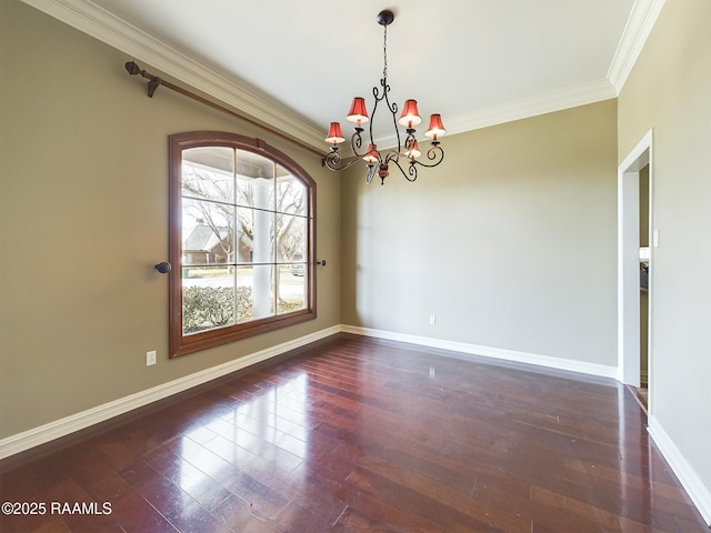 unfurnished dining area featuring crown molding, dark hardwood / wood-style floors, and an inviting chandelier