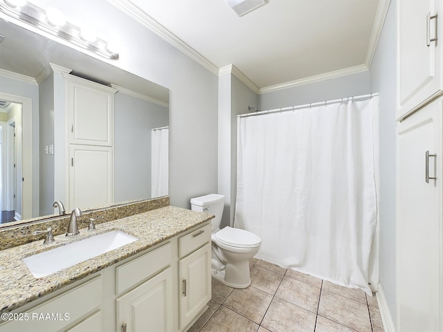 bathroom with ornamental molding, toilet, tile patterned flooring, and vanity