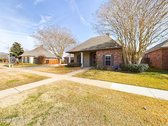 view of front of home with a front yard