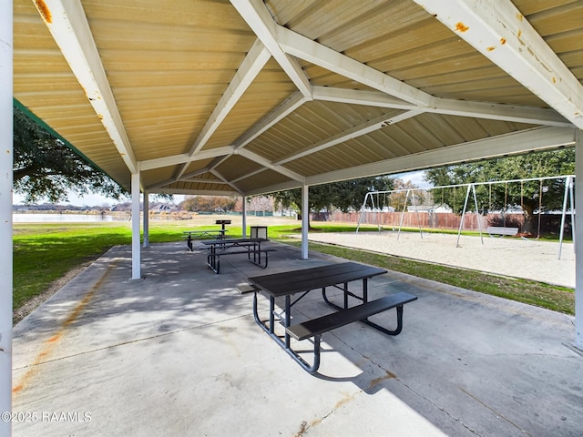 view of community featuring a lawn and volleyball court