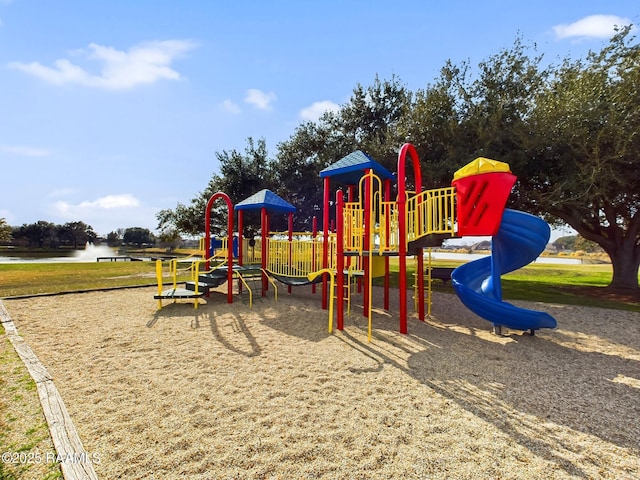 view of jungle gym with a water view