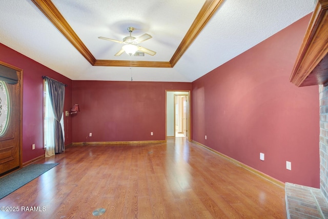 107 W Bayou Shr, Lafayette, LA 70508 - interior space with a tray ceiling, ceiling fan, light hardwood / wood-style flooring, and ornamental molding