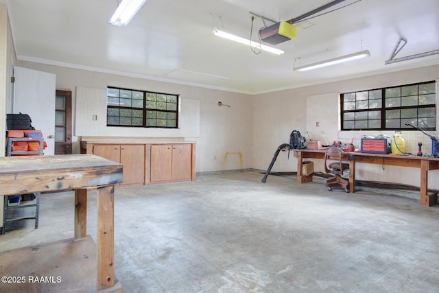 107 W Bayou Shr, Lafayette, LA 70508 - garage with a workshop area and a garage door opener