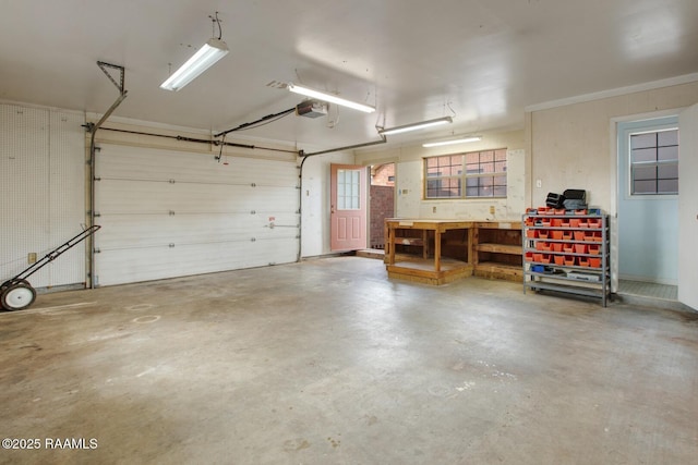 107 W Bayou Shr, Lafayette, LA 70508 - garage with a workshop area and a garage door opener