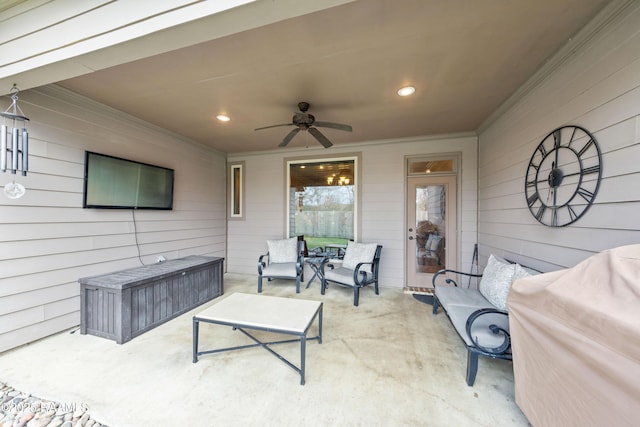 view of patio / terrace featuring ceiling fan and an outdoor living space