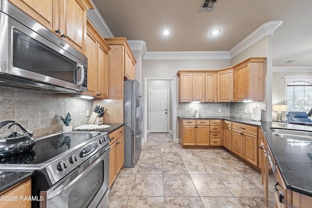 kitchen with stainless steel appliances, decorative backsplash, crown molding, light tile patterned flooring, and sink