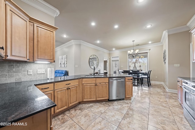 kitchen featuring a chandelier, stainless steel appliances, crown molding, pendant lighting, and sink