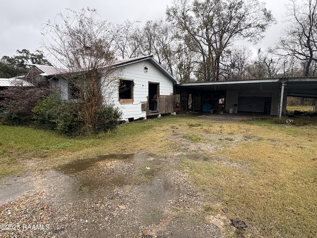 view of front of property with a carport