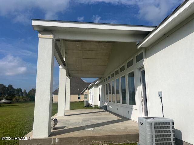 view of patio featuring central air condition unit