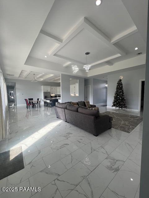 unfurnished living room with a chandelier