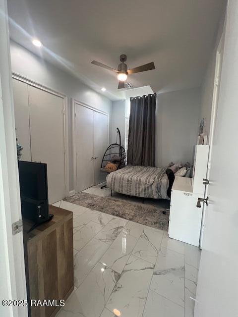 bedroom featuring ceiling fan