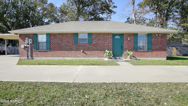 single story home with a carport