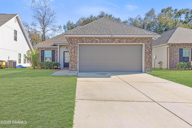 view of front of property with a garage, central air condition unit, and a front lawn