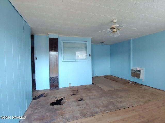 unfurnished room featuring ceiling fan and a wall mounted AC