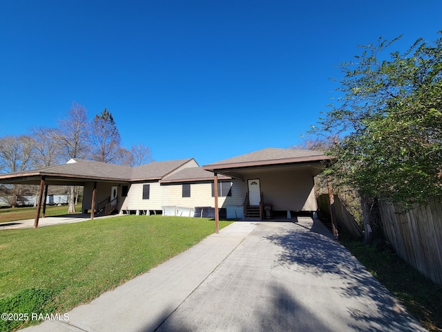 ranch-style house with a front lawn and a carport