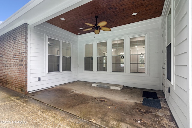 view of patio with ceiling fan