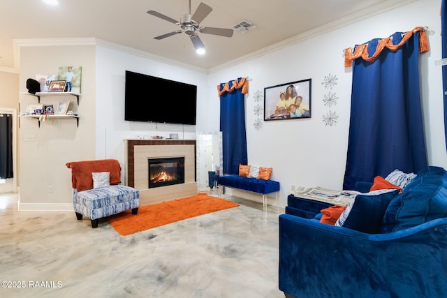 living room with ornamental molding and ceiling fan