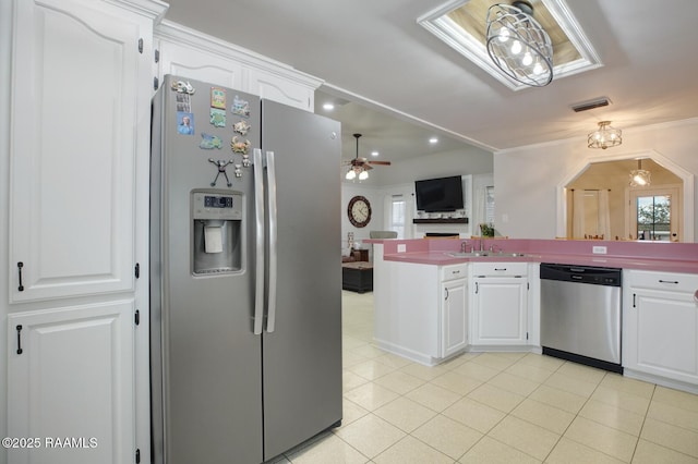 kitchen featuring light tile patterned flooring, sink, white cabinets, ceiling fan, and stainless steel appliances