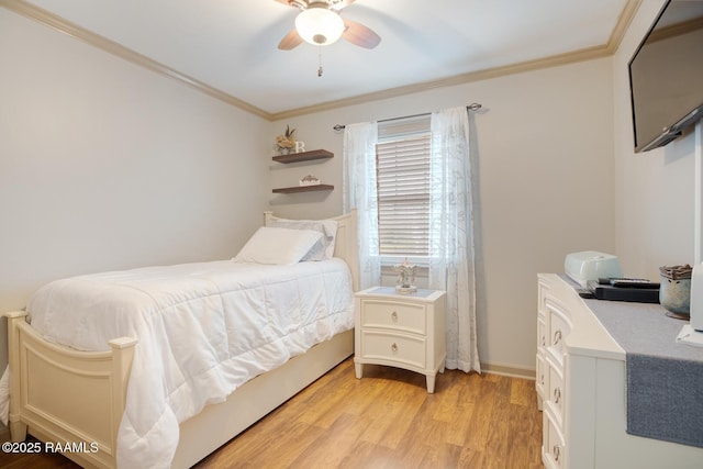 bedroom with crown molding, ceiling fan, and light hardwood / wood-style floors