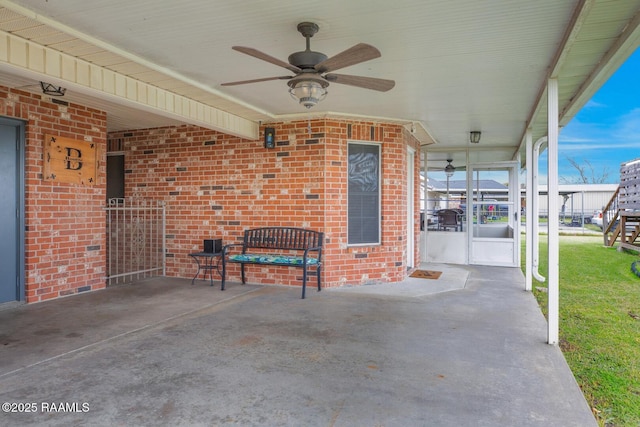 view of patio / terrace featuring ceiling fan