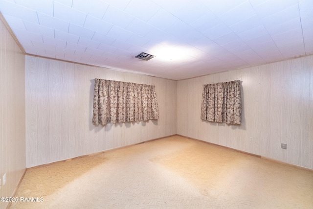 empty room with carpet flooring