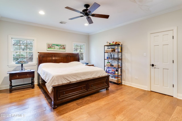 bedroom featuring crown molding, ceiling fan, and light hardwood / wood-style flooring