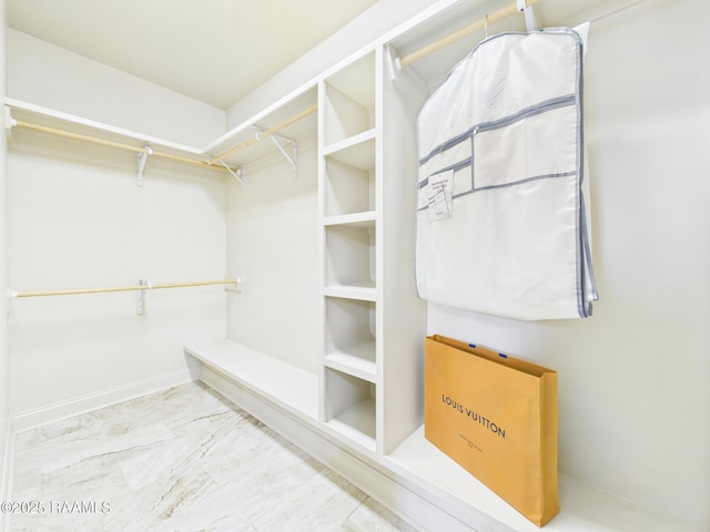 208 Rue De Frejus, Broussard, LA 70518 - walk in closet featuring marble look tiles