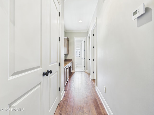 208 Rue De Frejus, Broussard, LA 70518 - corridor featuring ornamental molding, dark wood finished floors, and baseboards