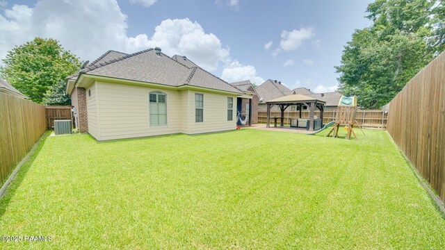 208 Rue De Frejus, Broussard, LA 70518 - rear view of property featuring a gazebo, a patio, cooling unit, and a shingled roof