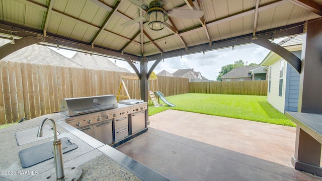 208 Rue De Frejus, Broussard, LA 70518 - view of patio featuring a ceiling fan and a playground