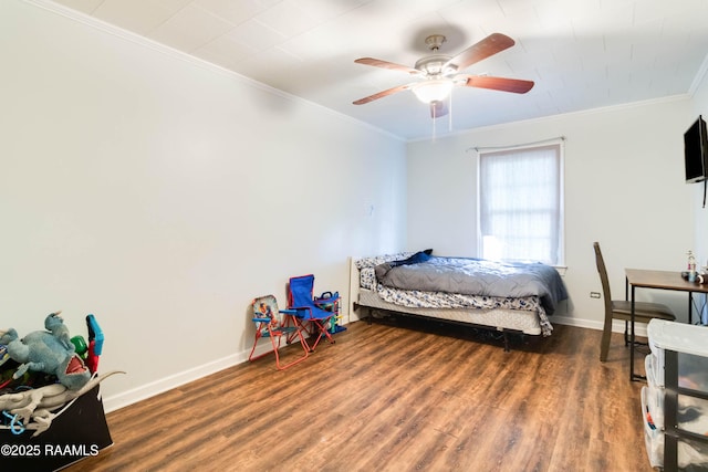 bedroom with dark wood-type flooring, ornamental molding, and ceiling fan