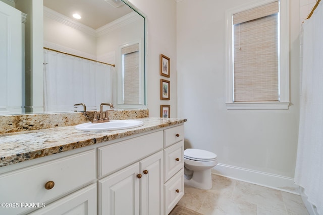 bathroom with toilet, curtained shower, crown molding, and vanity