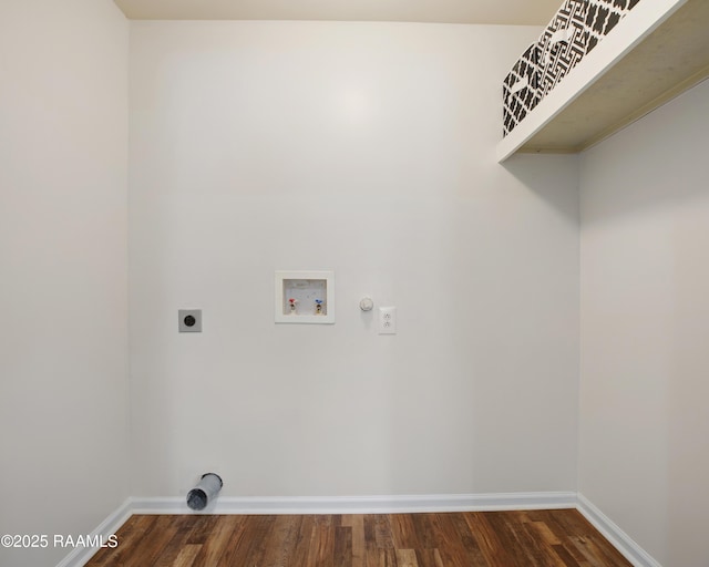 laundry area with hookup for a washing machine, dark hardwood / wood-style floors, hookup for an electric dryer, and gas dryer hookup