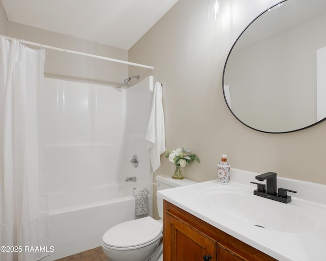 full bathroom featuring vanity, shower / tub combo, and toilet