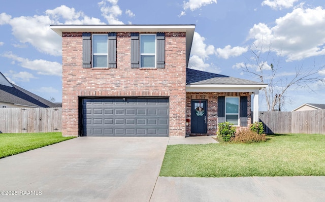 view of front of house with a front yard and a garage