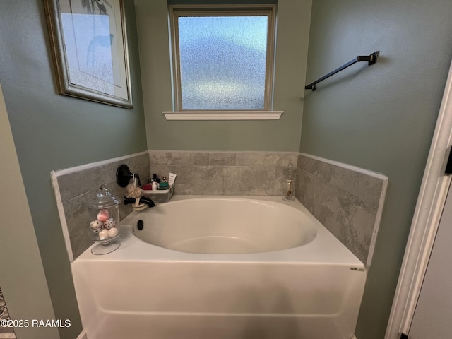 bathroom featuring a tub to relax in