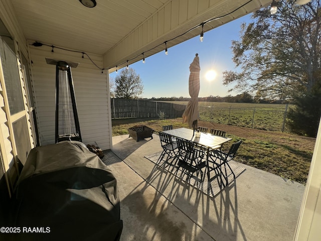 view of patio with a rural view