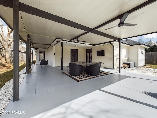 view of patio featuring french doors and ceiling fan