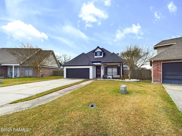 view of front of house with a garage and a front yard