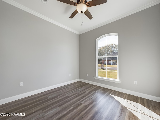 unfurnished room with crown molding, ceiling fan, and dark hardwood / wood-style flooring