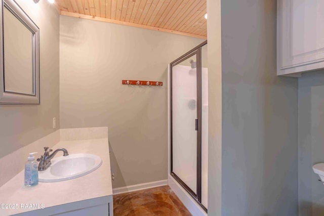 bathroom featuring toilet, a shower with shower door, wood ceiling, and vanity