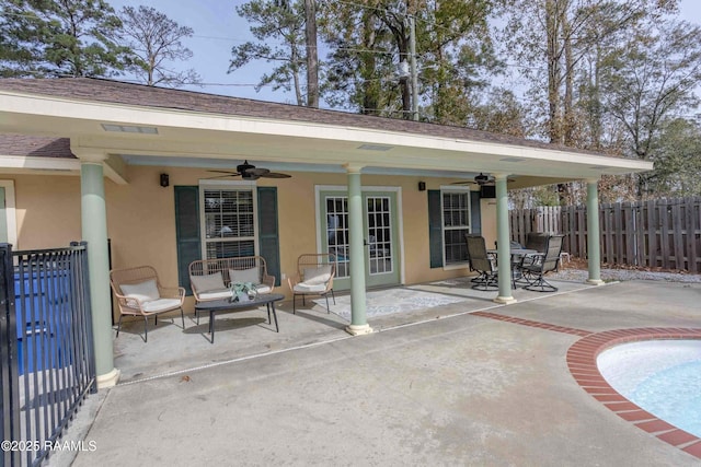 view of patio / terrace featuring ceiling fan