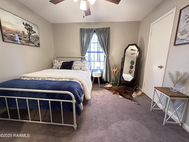 bedroom featuring ceiling fan and carpet flooring