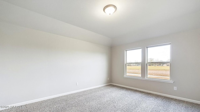 unfurnished room featuring carpet flooring