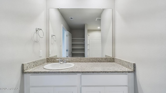 bathroom featuring vanity