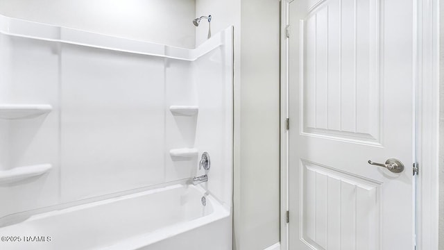 bathroom with shower / tub combination