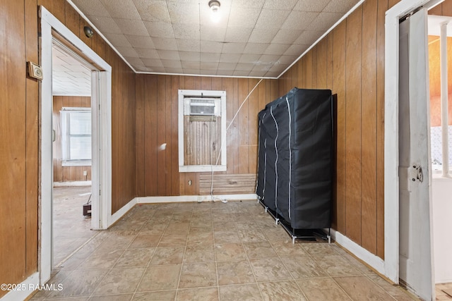 interior space featuring wooden walls