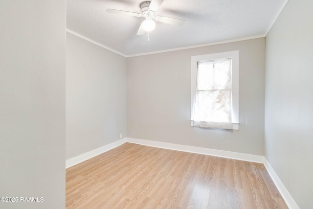 spare room with light wood-type flooring, ceiling fan, ornamental molding, and a textured ceiling